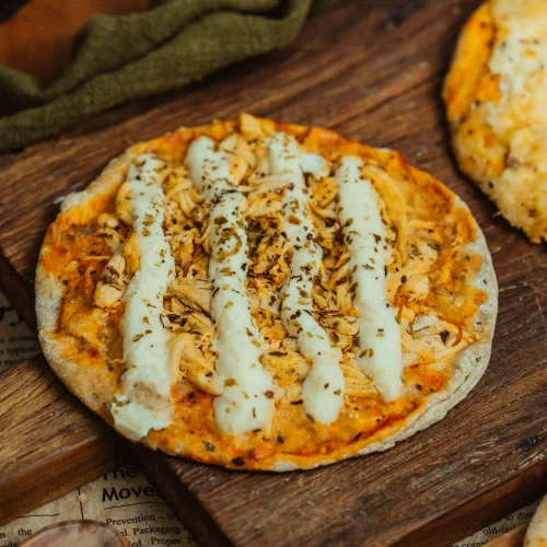 MINI PIZZA DE FRANGO COM REQUEIJÃO - INTEGRAL 150G